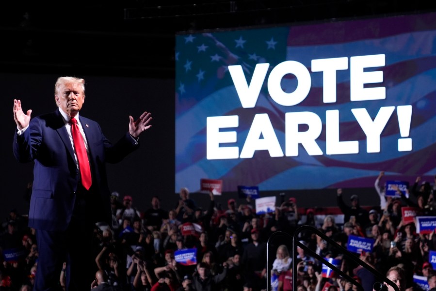 Republican presidential nominee former President Donald Trump gestures after speaking at a campaign rally, Friday, Oct. 18, 2024, in Detroit. (AP Photo/Evan Vucci)