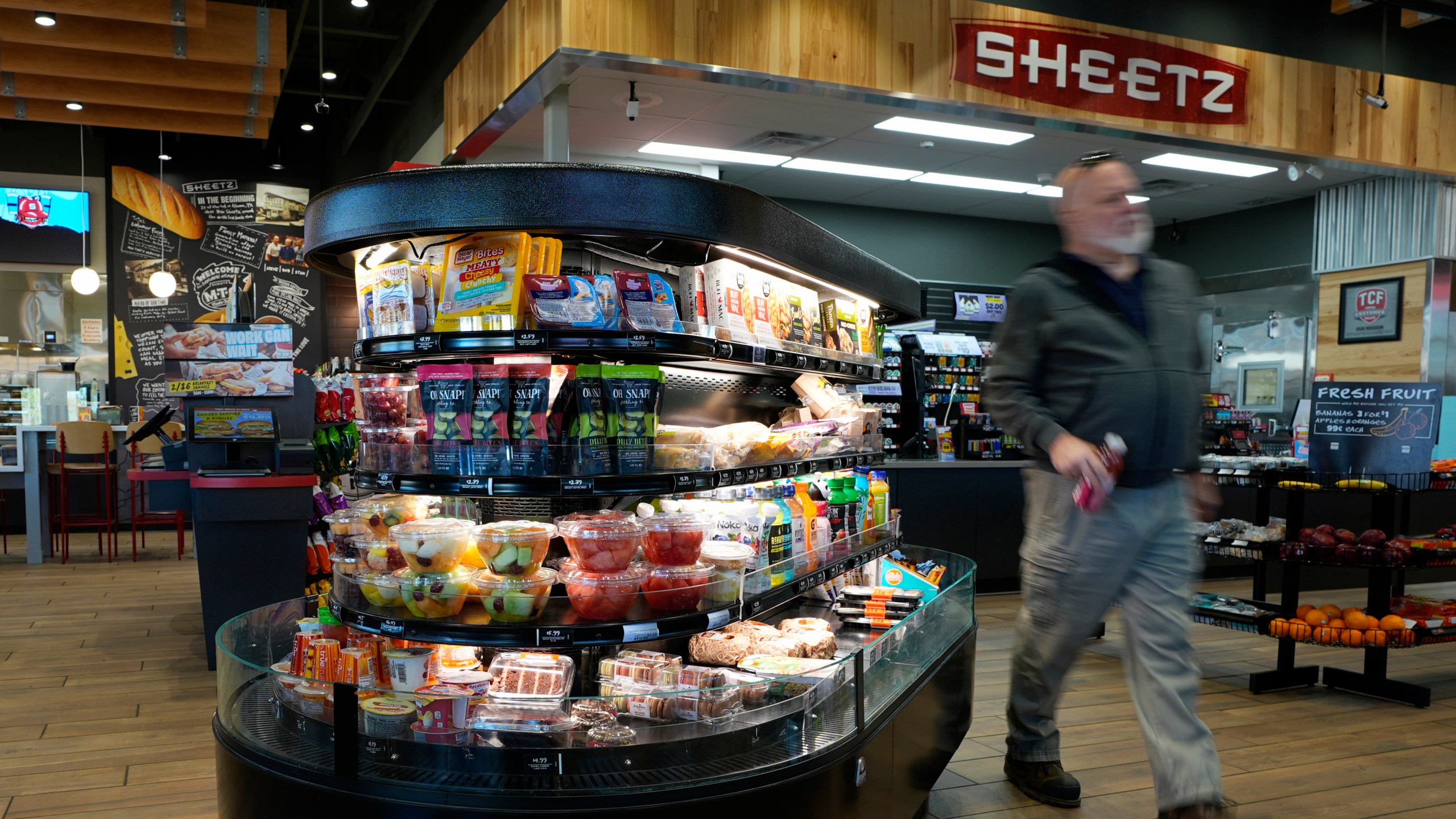 A customer walks through a Sheetz convenience store, Thursday, Oct. 17, 2024, in Bethlehem, Pa. (AP Photo/Matt Slocum)