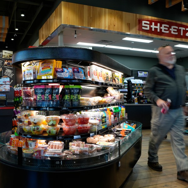 A customer walks through a Sheetz convenience store, Thursday, Oct. 17, 2024, in Bethlehem, Pa. (AP Photo/Matt Slocum)