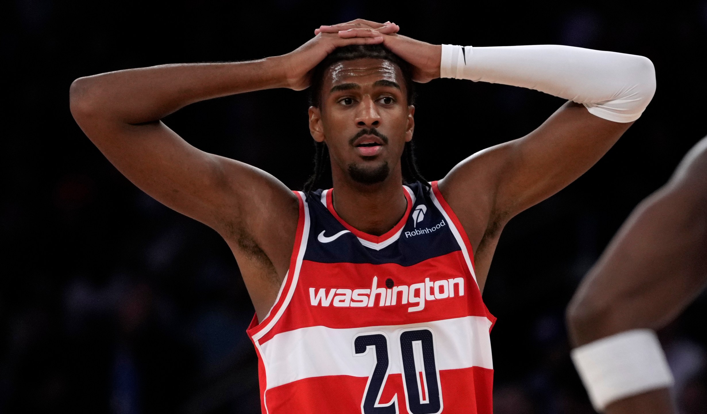 Washington Wizards' Alex Sarr stands on the court during the first half of a preseason NBA basketball game against the New York Knicks, Wednesday, Oct. 9, 2024, in New York. (AP Photo/Pamela Smith)