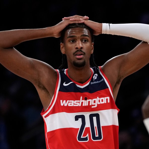 Washington Wizards' Alex Sarr stands on the court during the first half of a preseason NBA basketball game against the New York Knicks, Wednesday, Oct. 9, 2024, in New York. (AP Photo/Pamela Smith)