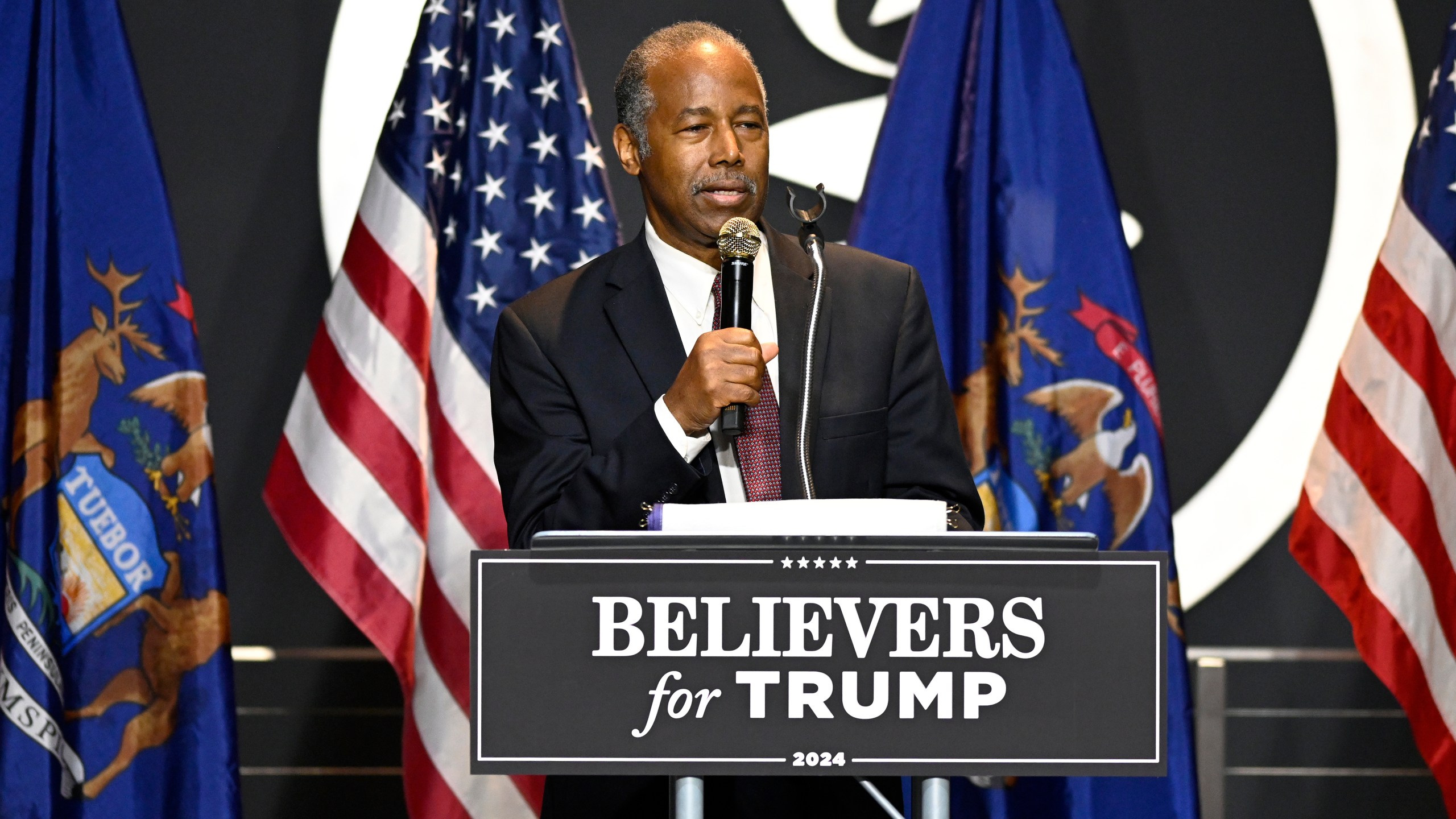 Ben Carson addresses supporters of Republican presidential nominee former President Donald Trump, Saturday, Oct. 5, 2024, in Livonia, Mich. (AP Photo/Jose Juarez)