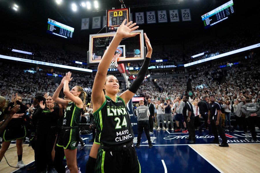 Minnesota Lynx forward Napheesa Collier (24) celebrates their victory over the New York Liberty after Game 4 of a WNBA basketball final playoff series, Friday, Oct. 18, 2024, in Minneapolis. The Lynx won 82-80, forcing a Game 5 in the series. (AP Photo/Abbie Parr)