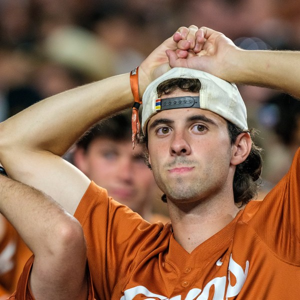 Texas fans watch the clock run out during the second half of an NCAA college football game against Georgia in Austin, Texas, Saturday, Oct. 19, 2024. (AP Photo/Rodolfo Gonzalez)