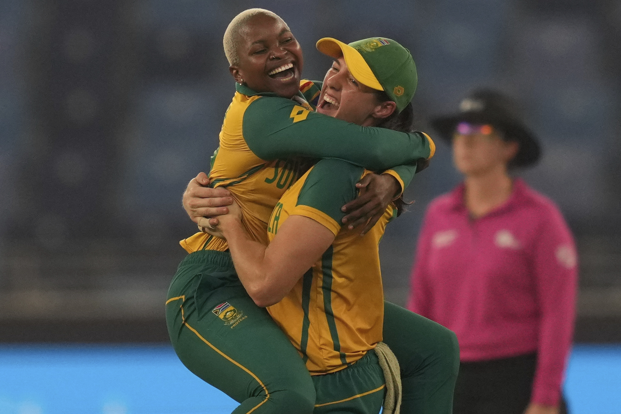 South Africa's Nonkululeko Mlaba, left, celebrates the wicket of New Zealand's Suzie Bates during the ICC Women's T20 World Cup 2024 final match between New Zealand and South Africa at Dubai, United Arab Emirates, Sunday, Oct. 20, 2024. (AP Photo/Altaf Qadri)