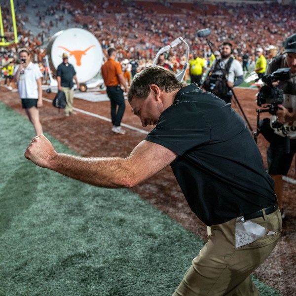 Georgia head coach Kirby Smart celebrates with Georgia fans cheering from the stands after defeating Texas during an NCAA college football game in Austin, Texas, Saturday, Oct. 19, 2024. (AP Photo/Rodolfo Gonzalez)