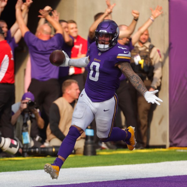 Minnesota Vikings linebacker Ivan Pace Jr. (0) scores on a 36-yard fumble recovery against the Detroit Lions during the second half of an NFL football game Sunday, Oct. 20, 2024, in Minneapolis. (AP Photo/Bruce Kluckhohn)