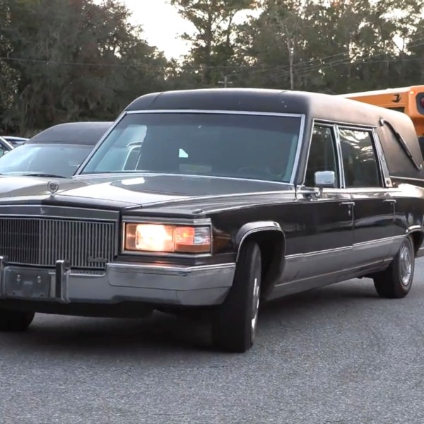 A hearse heads to Meridian Dock in McIntosh county where several people after a gangway collapsed plunging them into the water, on Sapelo Island, Ga in McIntosh county, Sunday, Oct. 20, 2024. (AP Photo/Lewis M. Levine)