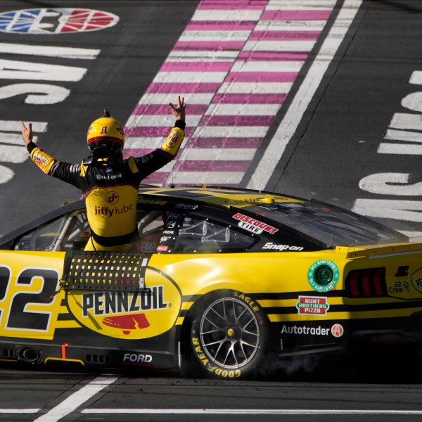 NASCAR Cup Series driver Joey Logano (22) celebrates after winning a NASCAR Cup Series auto race Sunday, Oct. 20, 2024, in Las Vegas. (AP Photo/John Locher)