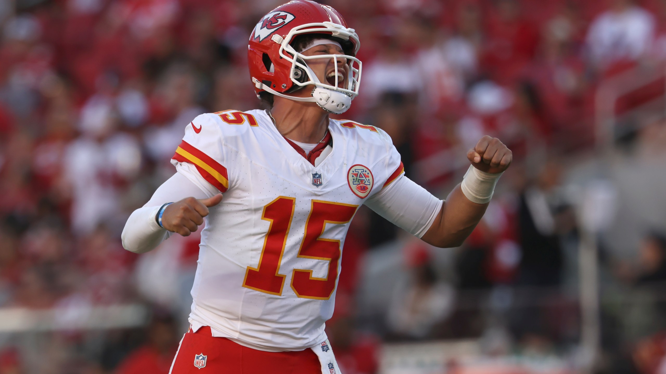 Kansas City Chiefs quarterback Patrick Mahomes (15) celebrates after a touchdown by Mecole Hardman during the second half of an NFL football game against the San Francisco 49ers in Santa Clara, Calif., Sunday, Oct. 20, 2024. (AP Photo/Jed Jacobsohn)