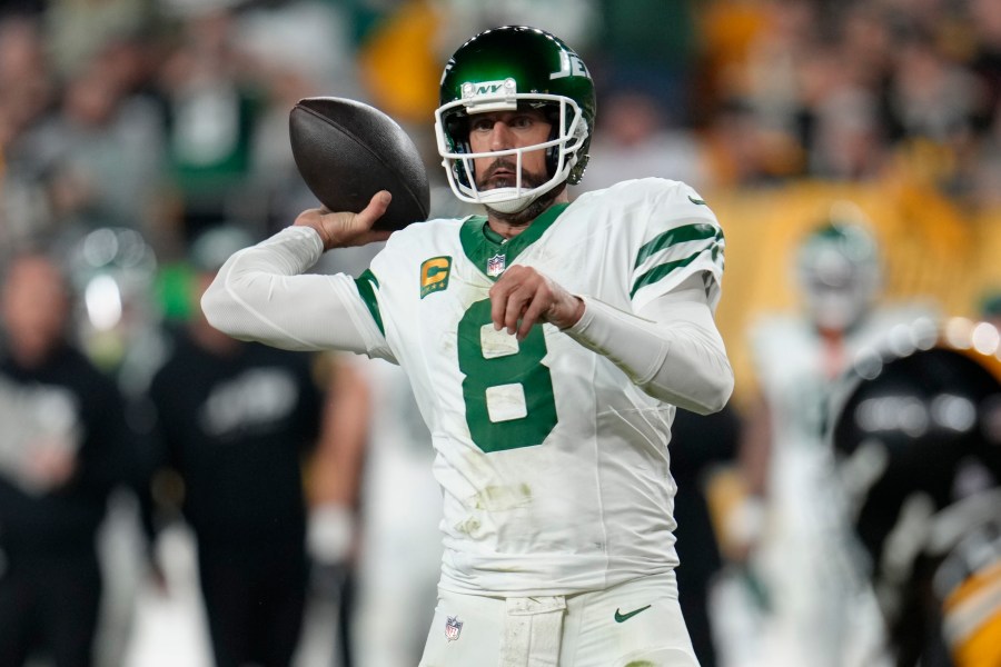 New York Jets quarterback Aaron Rodgers (8) passes in the first half of an NFL football game against the Pittsburgh Steelers in Pittsburgh, Sunday, Oct. 20, 2024. (AP Photo/Gene J. Puskar)