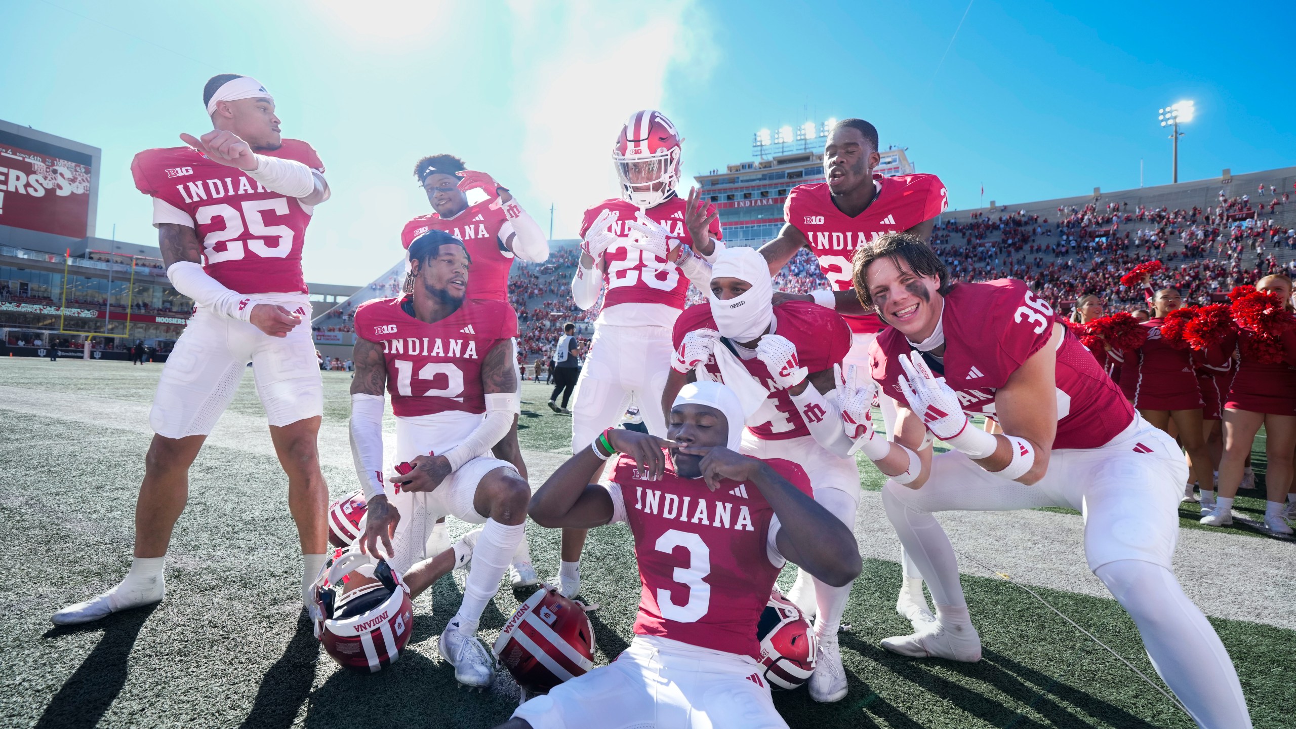 Indiana teammates celebrate after defeating Nebraska in an NCAA college football game in Bloomington, Ind., Saturday, Oct. 19, 2024. (AP Photo/AJ Mast)