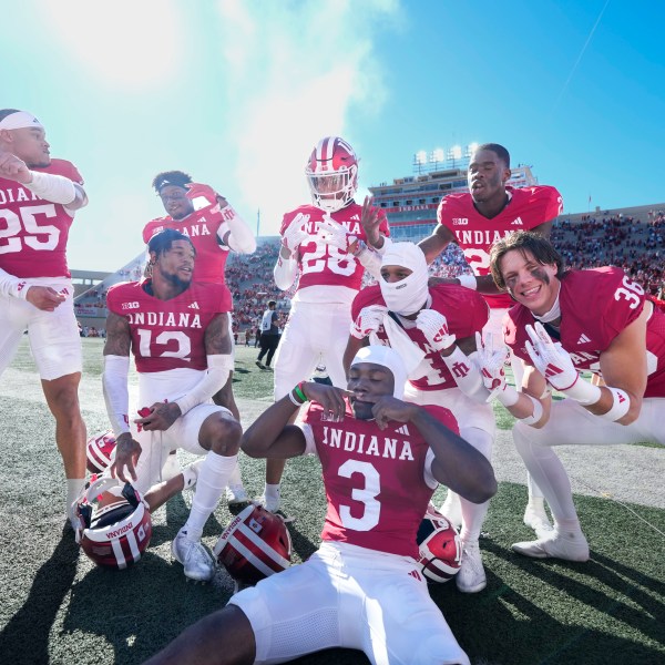 Indiana teammates celebrate after defeating Nebraska in an NCAA college football game in Bloomington, Ind., Saturday, Oct. 19, 2024. (AP Photo/AJ Mast)