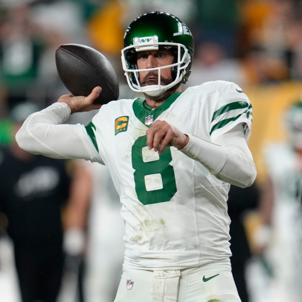 New York Jets quarterback Aaron Rodgers (8) passes in the first half of an NFL football game against the Pittsburgh Steelers in Pittsburgh, Sunday, Oct. 20, 2024. (AP Photo/Gene J. Puskar)