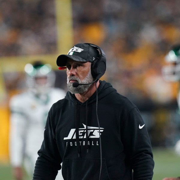 New York Jets head coach Jeff Ulbrich watches fro the sideline in the second half of an NFL football game against the Pittsburgh Steelers in Pittsburgh, Sunday, Oct. 20, 2024. (AP Photo/Matt Freed)