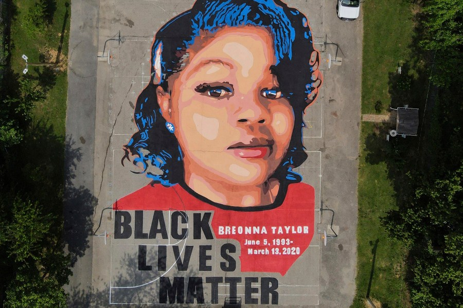 FILE - A ground mural depicting a portrait of Breonna Taylor is seen at Chambers Park in Annapolis, Md., July 6, 2020. (AP Photo/Julio Cortez, File)