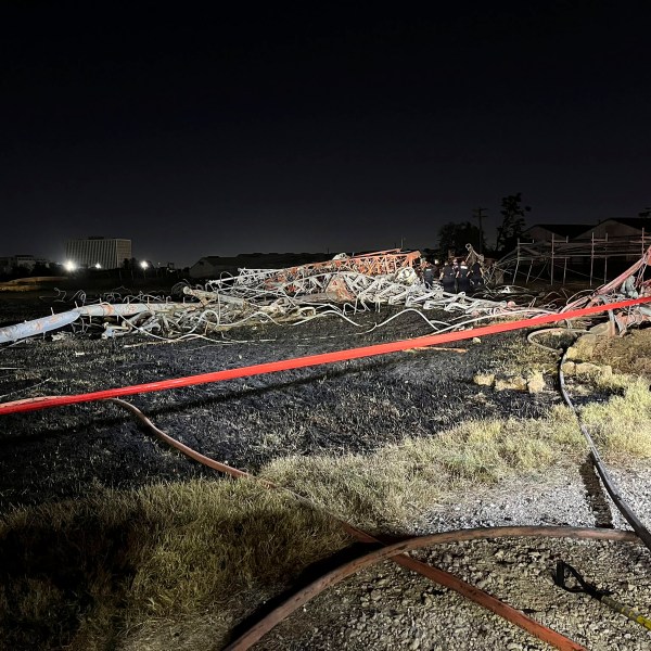 This image provided by the Houston Fire Department shows the scene of a helicopter crash in the city's Second Ward, Sunday, Oct. 20, 2024. (Houston Fire Department via AP)