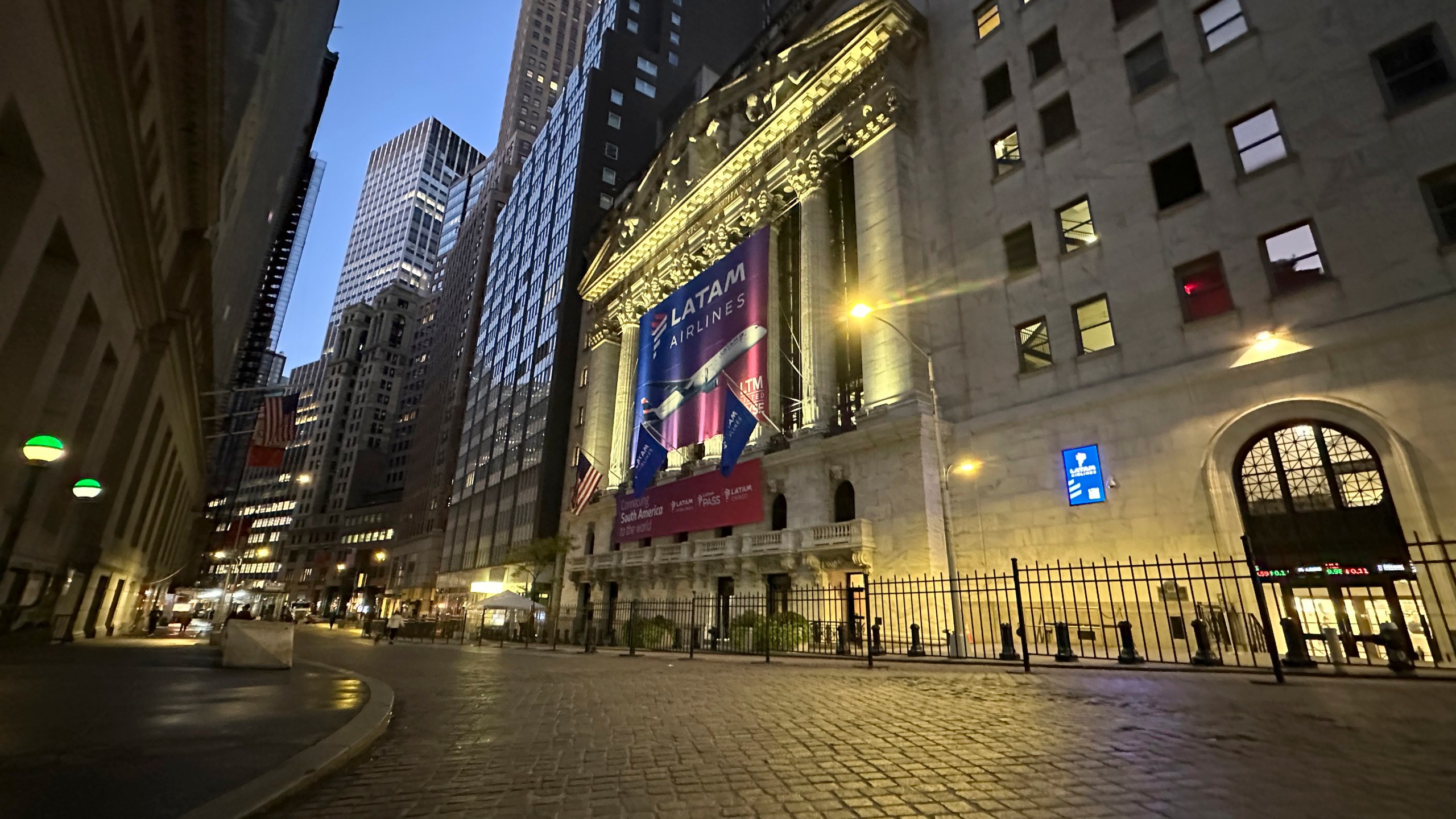 A banner for LATAM Airlines hangs from the front of the New York Stock Exchange on Tuesday, Oct. 22, 2024, in New York. (AP Photo/Peter Morgan)