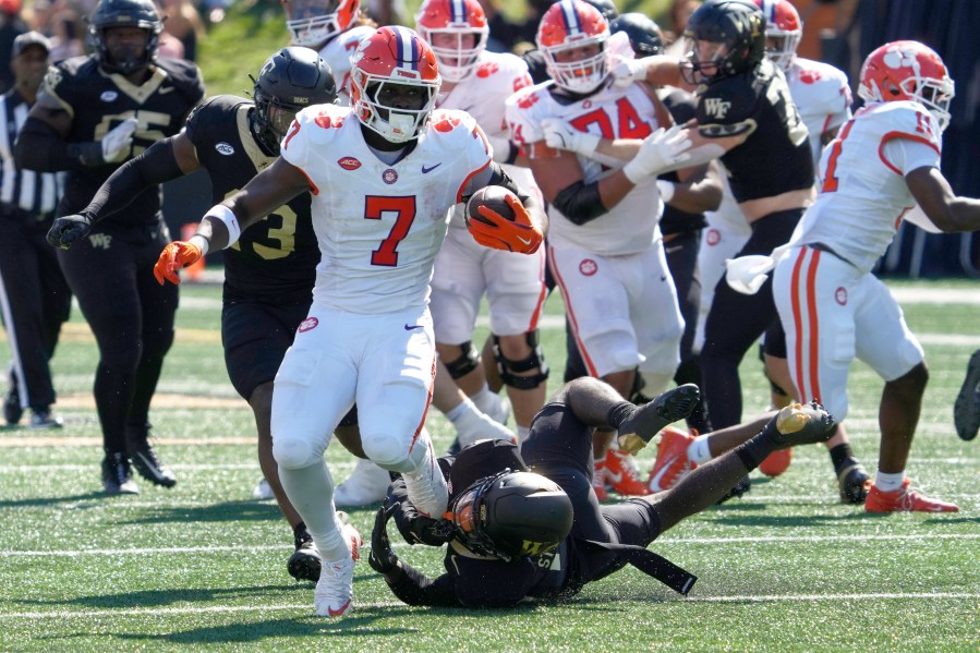 Clemson running back Phil Mafah (7) runs against Wake Forest during the first half of an NCAA football game in Greensboro, N.C., Saturday, Oct. 12, 2024. (AP Photo/Chuck Burton)