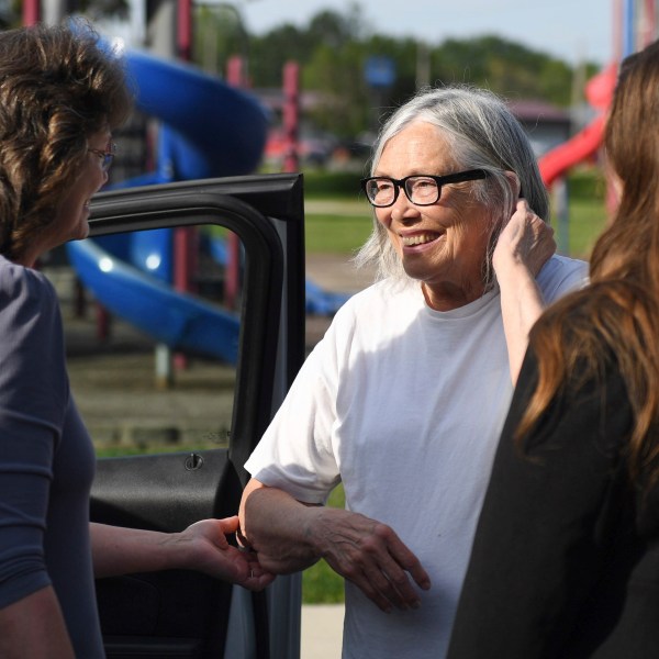 FILE - Sandra Hemme, center, meets with family and supporters after she was released from Chillicothe Correctional Center, Friday, July 19, 2024, in Chillicothe, Miss. (HG Biggs/The Kansas City Star via AP, File)