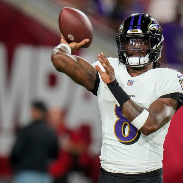 Baltimore Ravens quarterback Lamar Jackson (8) warms up before an NFL football game against the Tampa Bay Buccaneers, Monday, Oct. 21, 2024, in Tampa, Fla. (AP Photo/Chris O'Meara)