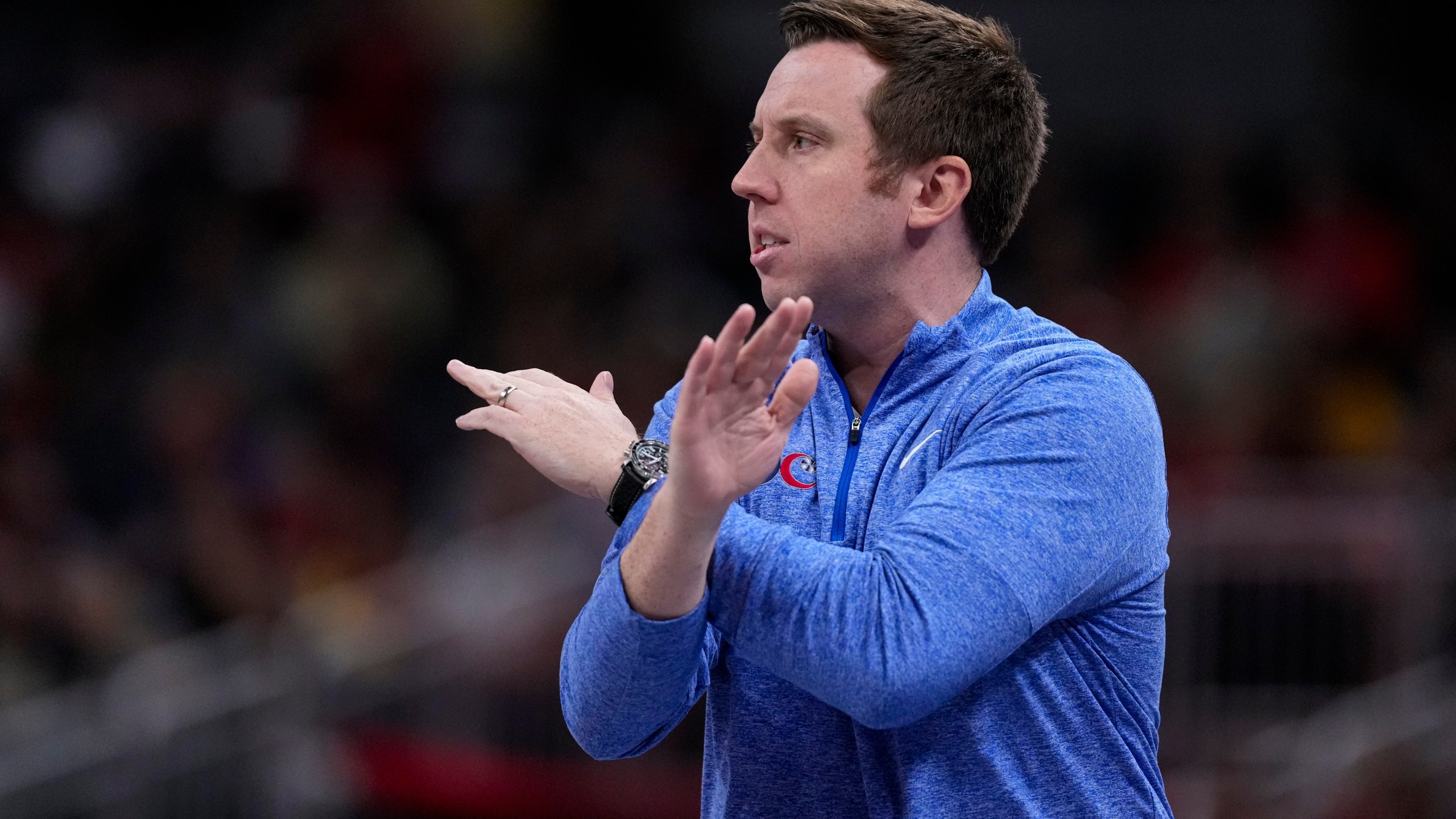 FILE - Washington Mystics head coach Eric Thibault signals to his team as they play against the Indiana Fever in the first half of a WNBA basketball game in Indianapolis, July 10, 2024. (AP Photo/Michael Conroy, File)