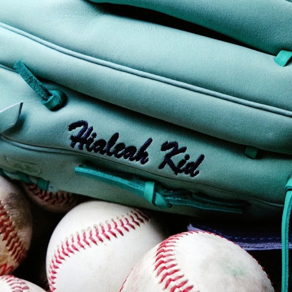 This image provided by Brent Habert, shows New York Yankees' Nestor Cortes' mint-colored costumed designed baseball glove. (Brent Habert via AP)