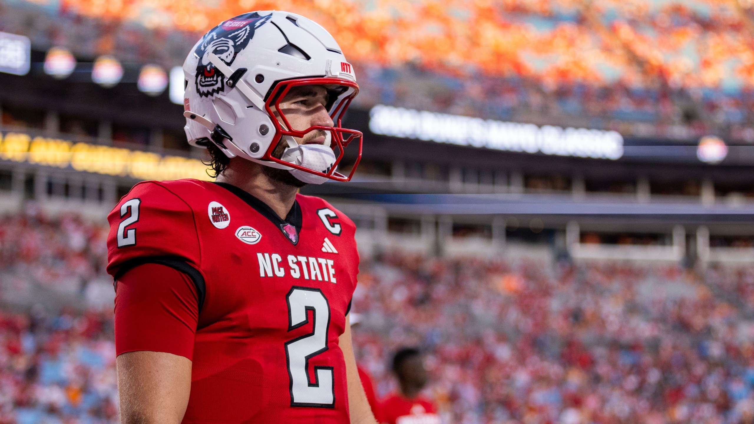 FILE - North Carolina State quarterback Grayson McCall (2) during the pre game warm up of an NCAA college football game, Sept. 8, 2024, in Charlotte, N.C. (AP Photo/Scott Kinser, File)