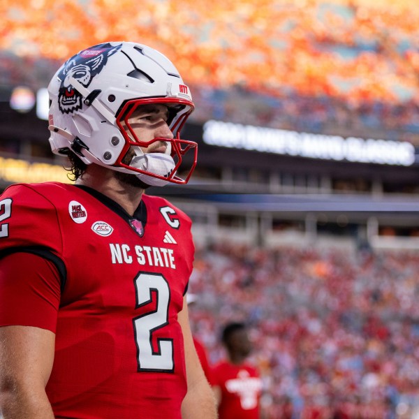 FILE - North Carolina State quarterback Grayson McCall (2) during the pre game warm up of an NCAA college football game, Sept. 8, 2024, in Charlotte, N.C. (AP Photo/Scott Kinser, File)