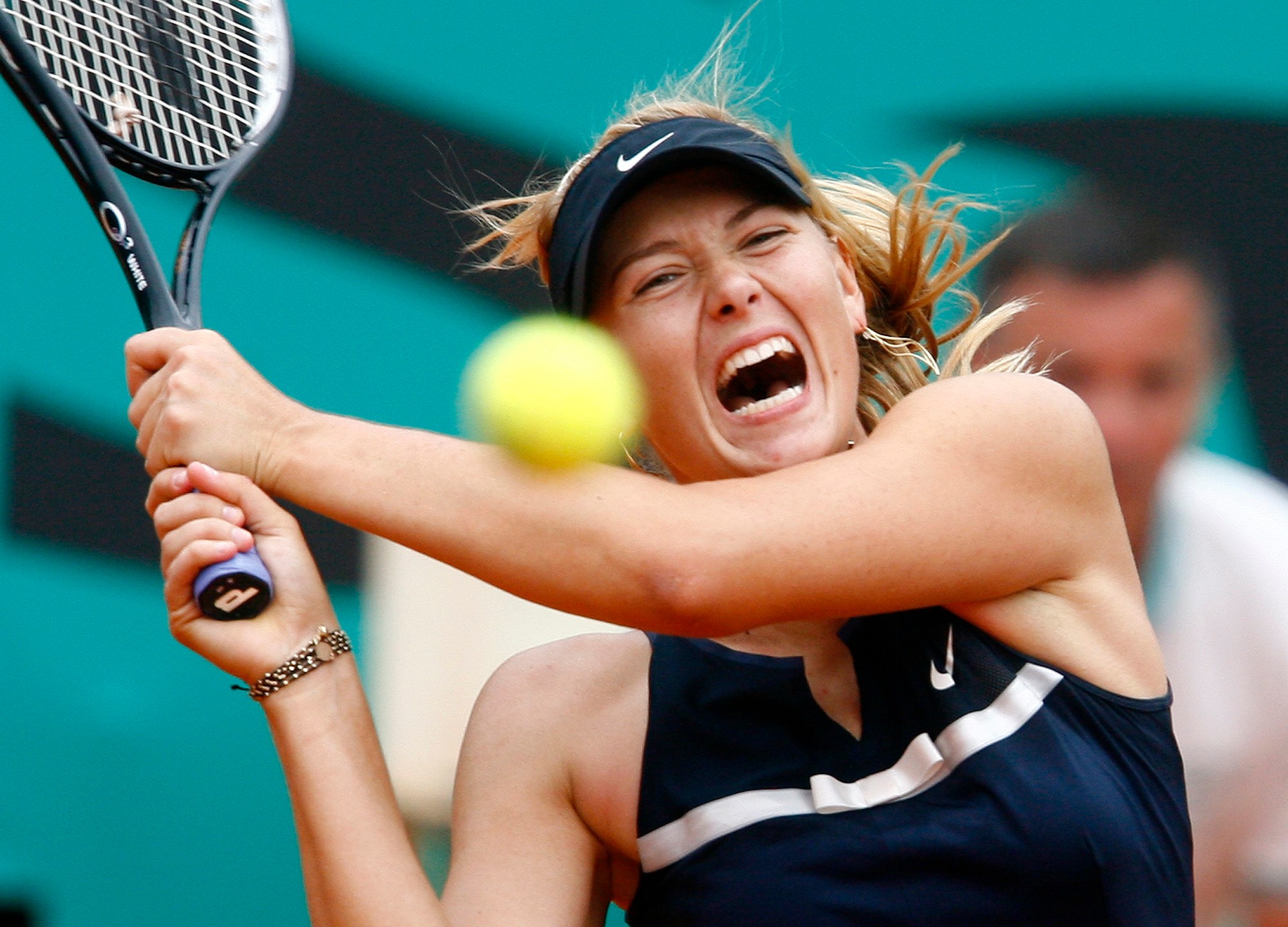 FILE - Russia's Maria Sharapova returns the ball to Italy's Karin Knapp during their third round match of the French Open tennis tournament at Roland Garros stadium in Paris, May 31, 2008. (AP Photo/David Vincent, File)