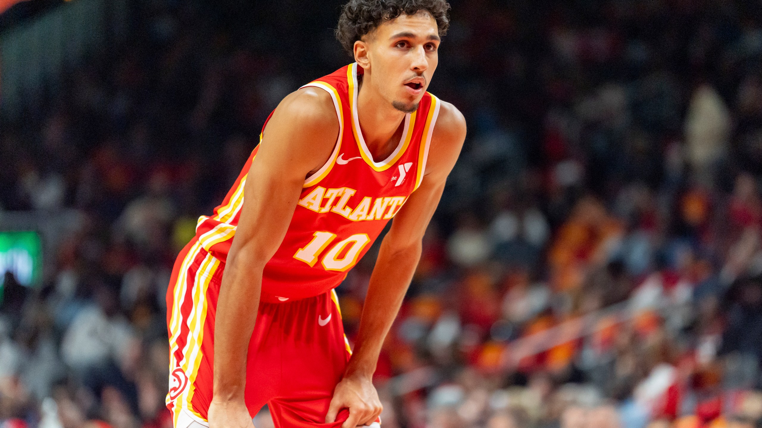 Atlanta Hawks forward Zaccharie Risacher (10) waits to attempt his free throws during the first half of an NBA basketball game against the Brooklyn Nets, Wednesday, Oct. 23, 2024, in Atlanta. (AP Photo/Jason Allen)