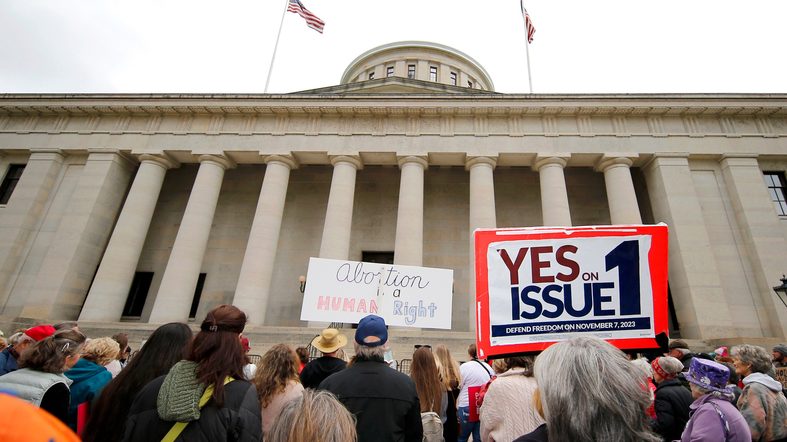 FILE - Supporters of Issue 1 attend a rally for the Right to Reproductive Freedom amendment held by Ohioans United for Reproductive Rights at the Ohio State House in Columbus, Ohio, Oct. 8, 2023. (AP Photo/Joe Maiorana, File)