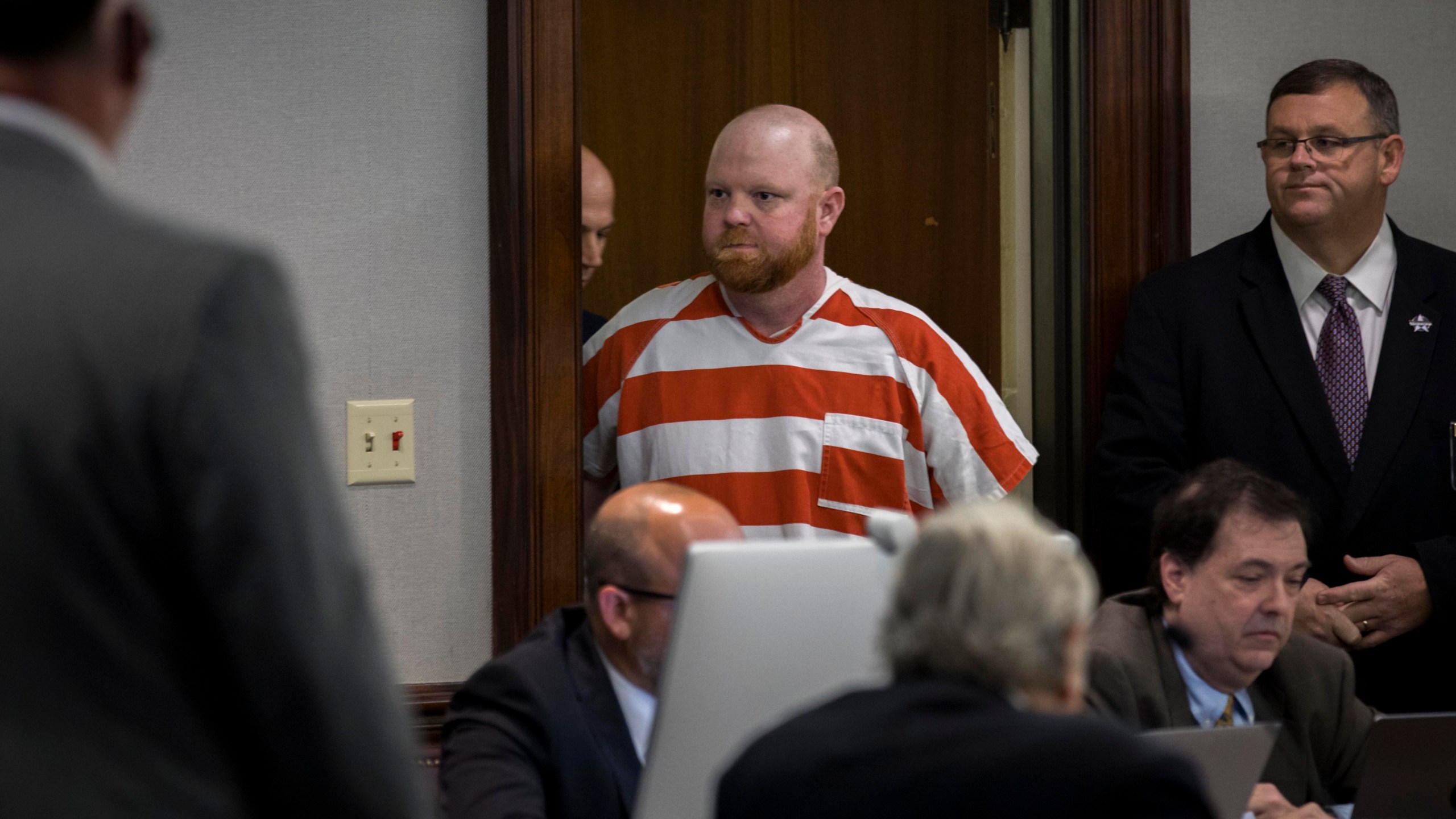 Travis McMichael enters a Glynn County courtroom before a hearing challenging his conviction of killing Ahmaud Arbery in 2020, Thursday, Oct. 24, 2024, in Brunswick, Ga. (AP Photo/Stephen B. Morton)