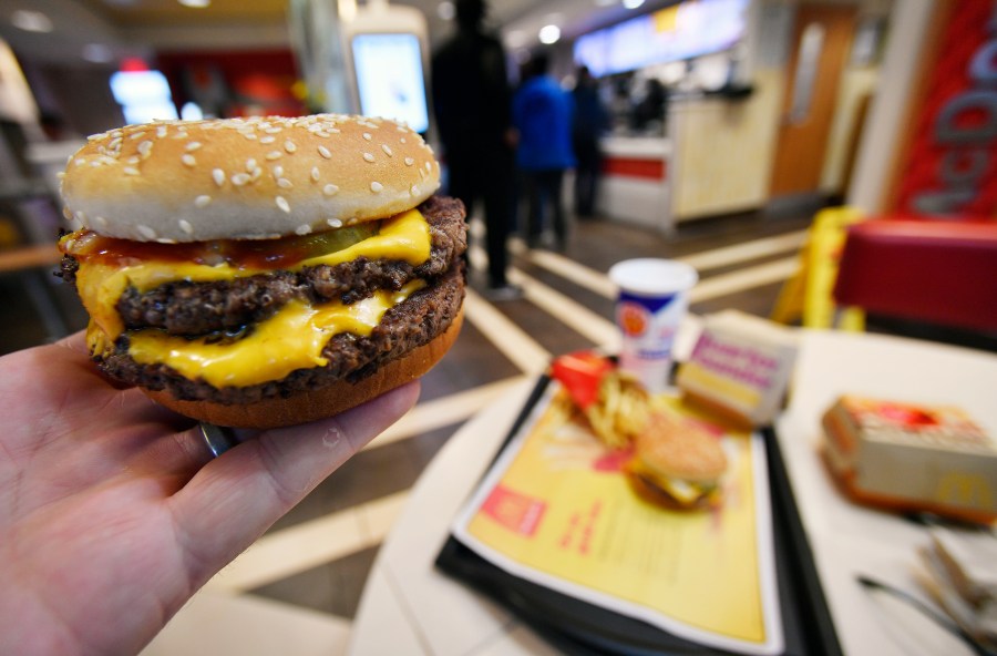 FILE - A McDonald's Double Quarter Pounder is shown on March 6, 2018, in Atlanta. (AP Photo/Mike Stewart, File)