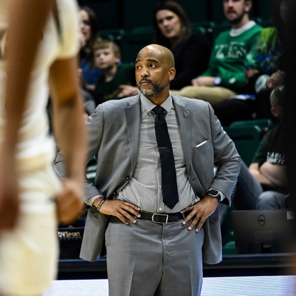 FILE - South Florida head coach Amir Abdur-Rahim looks on during the first half of an NCAA college basketball game against Charlotte, March 2, 2024, in Charlotte, N.C. (AP Photo/Matt Kelley, File)