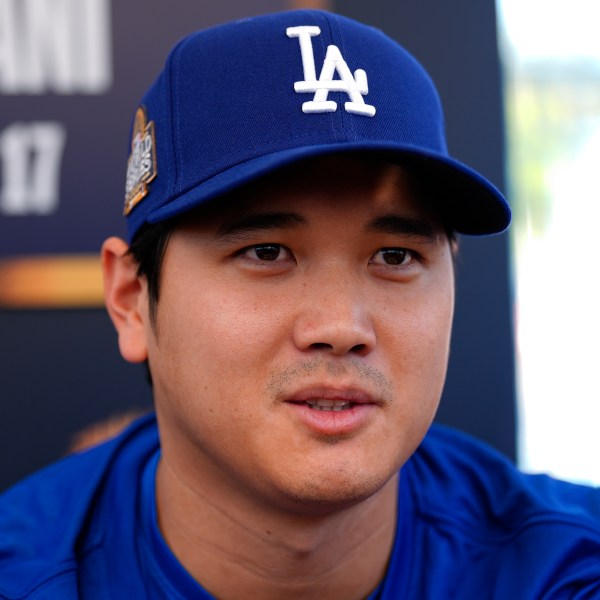 Los Angeles Dodgers' Shohei Ohtani speaks during media day for the baseball World Series against the New York Yankees, Thursday, Oct. 24, 2024, in Los Angeles. (AP Photo/Julio Cortez)