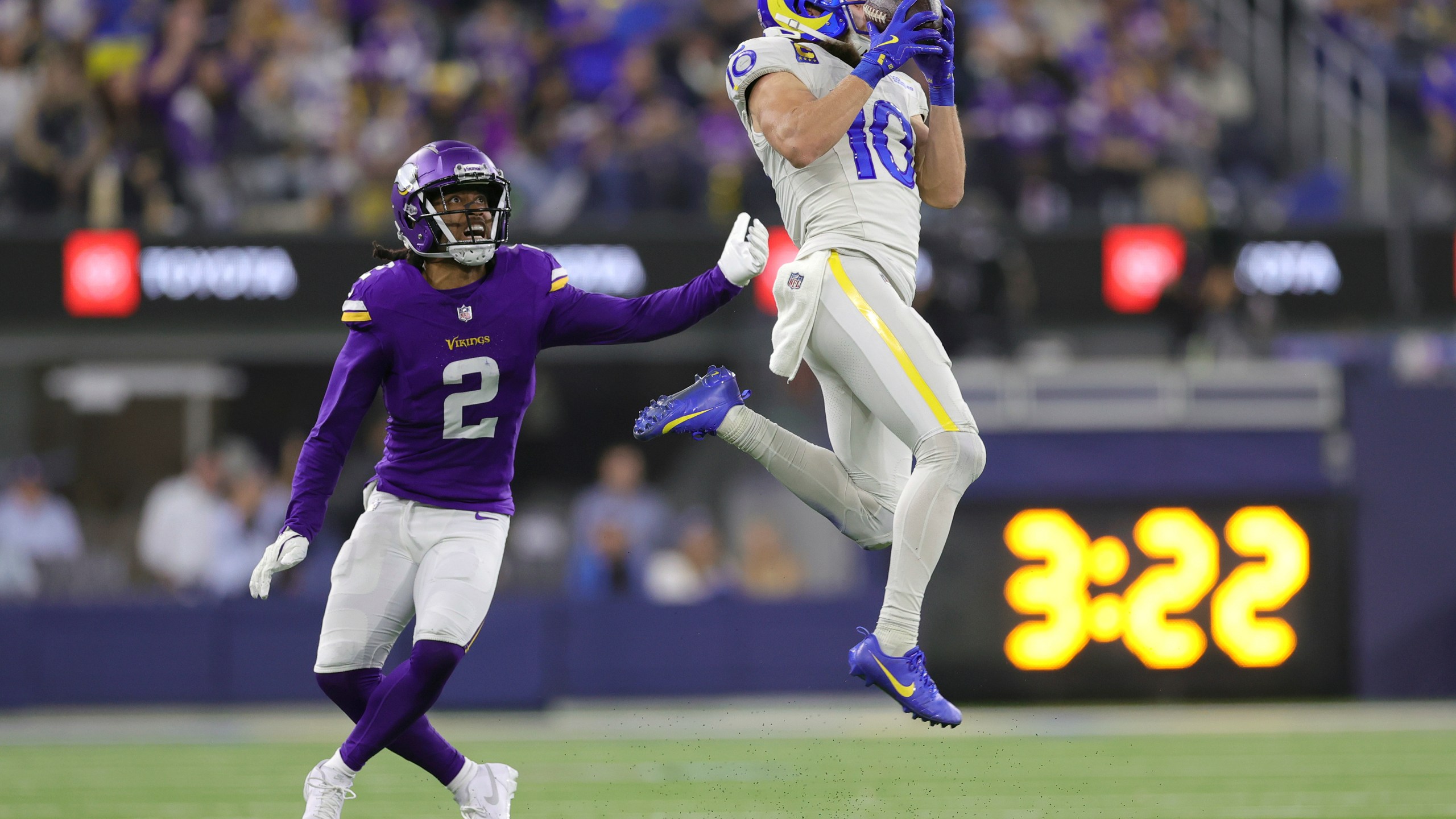 Los Angeles Rams wide receiver Cooper Kupp (10) catches a pass against Minnesota Vikings cornerback Stephon Gilmore (2) during the second half of an NFL football game, Thursday, Oct. 24, 2024, in Inglewood, Calif. (AP Photo/Ryan Sun)