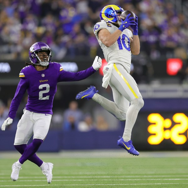 Los Angeles Rams wide receiver Cooper Kupp (10) catches a pass against Minnesota Vikings cornerback Stephon Gilmore (2) during the second half of an NFL football game, Thursday, Oct. 24, 2024, in Inglewood, Calif. (AP Photo/Ryan Sun)