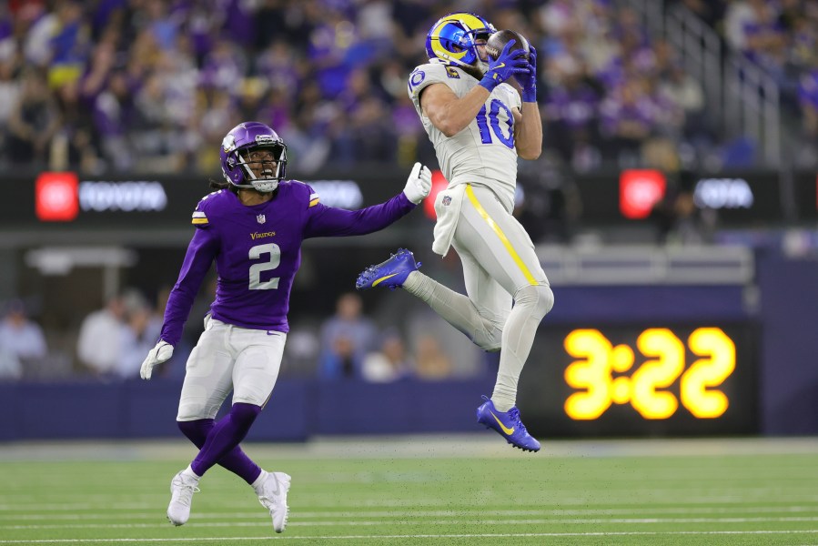 Los Angeles Rams wide receiver Cooper Kupp (10) catches a pass against Minnesota Vikings cornerback Stephon Gilmore (2) during the second half of an NFL football game, Thursday, Oct. 24, 2024, in Inglewood, Calif. (AP Photo/Ryan Sun)