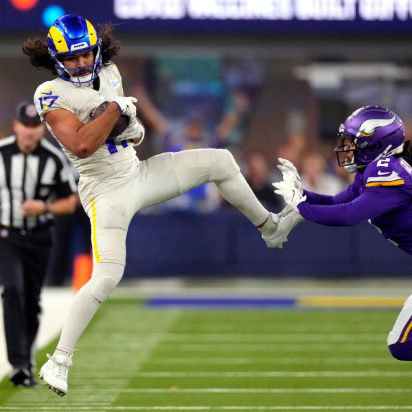 Los Angeles Rams wide receiver Puka Nacua (17) catches a pass as Minnesota Vikings cornerback Stephon Gilmore (2) defends during the second half of an NFL football game Thursday, Oct. 24, 2024, in Inglewood, Calif. (AP Photo/Mark J. Terrill)