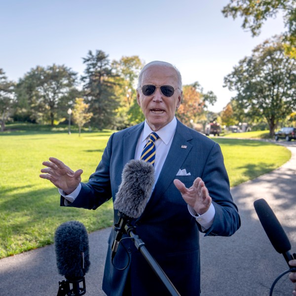 President Joe Biden stops to speak to the media as he walks to board Marine One at the South Lawn of the White House in Washington, Thursday, Oct. 24, 2024. (AP Photo/Ben Curtis)