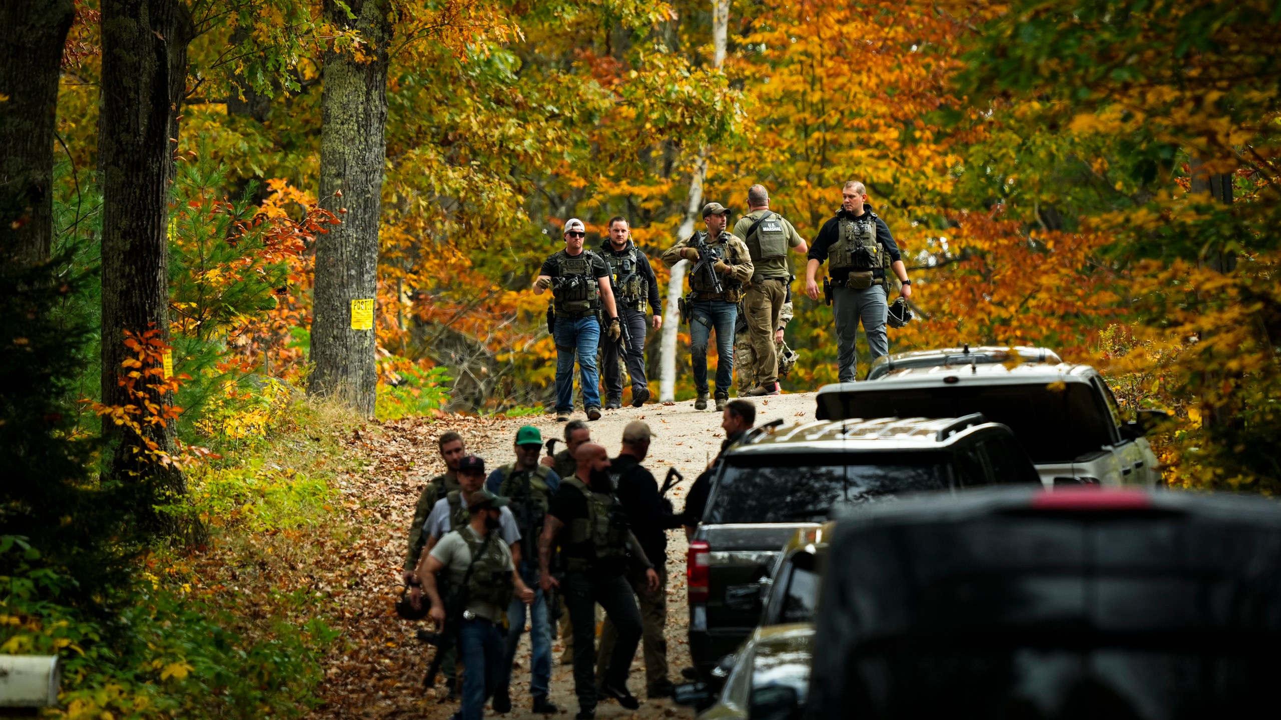 FILE - Law enforcement continue a manhunt in the aftermath of a mass shooting, in Durham, Maine, Oct. 27, 2023. (AP Photo/Matt Rourke, File)