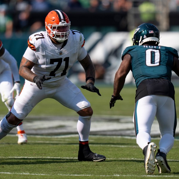 FILE - Cleveland Browns tackle Jedrick Wills Jr. (71) in action against Philadelphia Eagles defensive end Bryce Huff (0) during the NFL football game, Sunday, Oct. 13, 2024, in Philadelphia. (AP Photo/Chris Szagola, File)