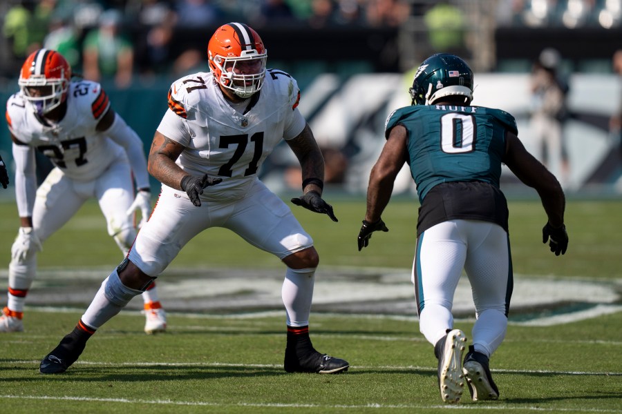 FILE - Cleveland Browns tackle Jedrick Wills Jr. (71) in action against Philadelphia Eagles defensive end Bryce Huff (0) during the NFL football game, Sunday, Oct. 13, 2024, in Philadelphia. (AP Photo/Chris Szagola, File)