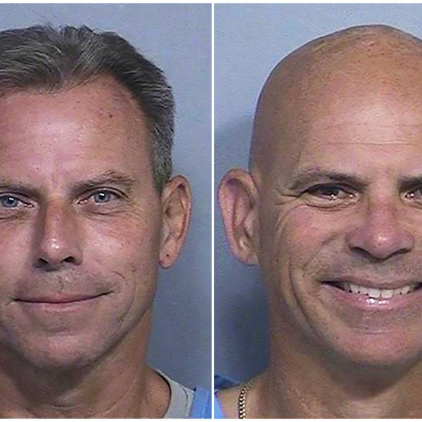 This combination of two booking photos provided by the California Department of Corrections shows Erik Menendez, left, and Lyle Menendez. (California Dept. of Corrections via AP)