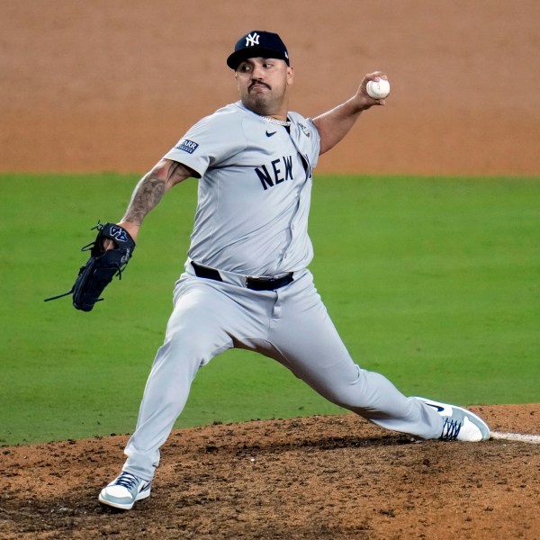 Los Angeles Dodgers pitcher Nestor Cortes throws against the Los Angeles Dodgers during the 10th inning in Game 1 of the baseball World Series, Friday, Oct. 25, 2024, in Los Angeles. (AP Photo/Julio Cortez)