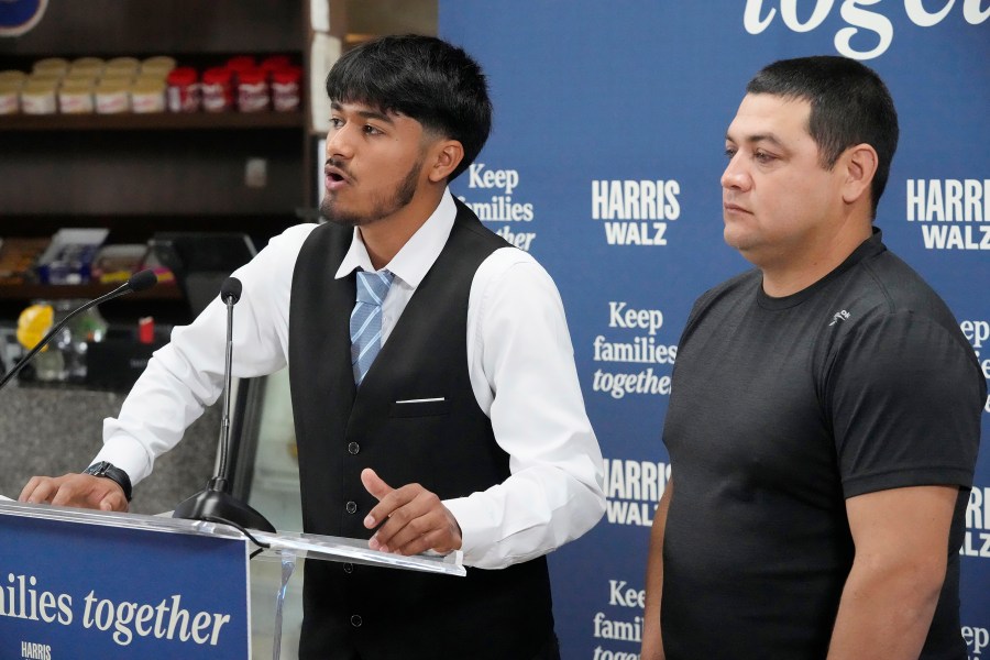 FILE - Billy and his father, no last name given, speak at a Democratic Party campaign event, about their experience of being separated when they crossed the U.S.- Mexico border during the Trump administration, Oct. 16, 2024, in Doral, Fla. (AP Photo/Marta Lavandier, File)