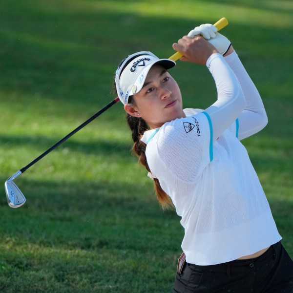 Jeeno Thitikul of Thailand watches her fairway shot on the third hole during the second round of Maybank LPGA Championship golf tournament at Kuala Lumpur Golf and Country club in Kuala Lumpur, Thursday, Oct. 24, 2024. (AP Photo/Vincent Thian)