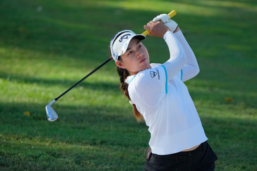 Jeeno Thitikul of Thailand watches her fairway shot on the third hole during the second round of Maybank LPGA Championship golf tournament at Kuala Lumpur Golf and Country club in Kuala Lumpur, Thursday, Oct. 24, 2024. (AP Photo/Vincent Thian)