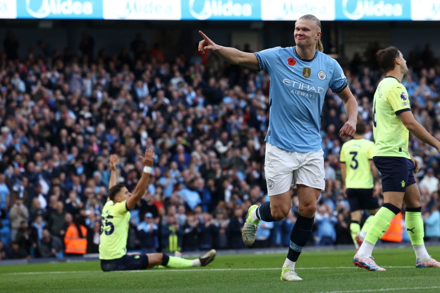 Manchester City's Erling Haaland celebrates after scoring his side's opening goal during the English Premier League soccer match between Manchester City and Southampton at the Etihad Stadium in Manchester, England, Saturday, Oct. 26, 2024. (AP Photo/Darren Staples)